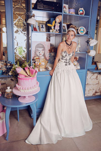 Dazzle the day away in the Florence Gown! This playful doll wedding gown features exquisite details and alluring lace, making it the perfect outfit for any special occasion. Look and feel like royalty with this luxurious robe – perfect for making memories that will last a lifetime.