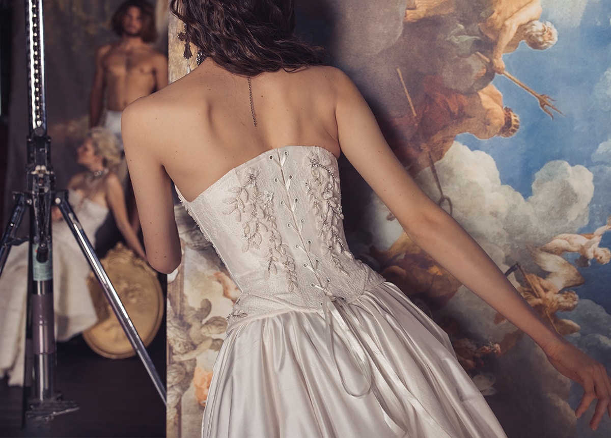 Indulge in luxury with the Isabelle Gown. Crafted with a structured corset dress, this gown features intricate Indian embroidery on the bodice and a voluminous skirt. Made from high-quality silk taffeta, it exudes elegance and sophistication, making it the perfect choice for any formal occasion. The thigh high slit adds a touch of allure to this stunning gown.