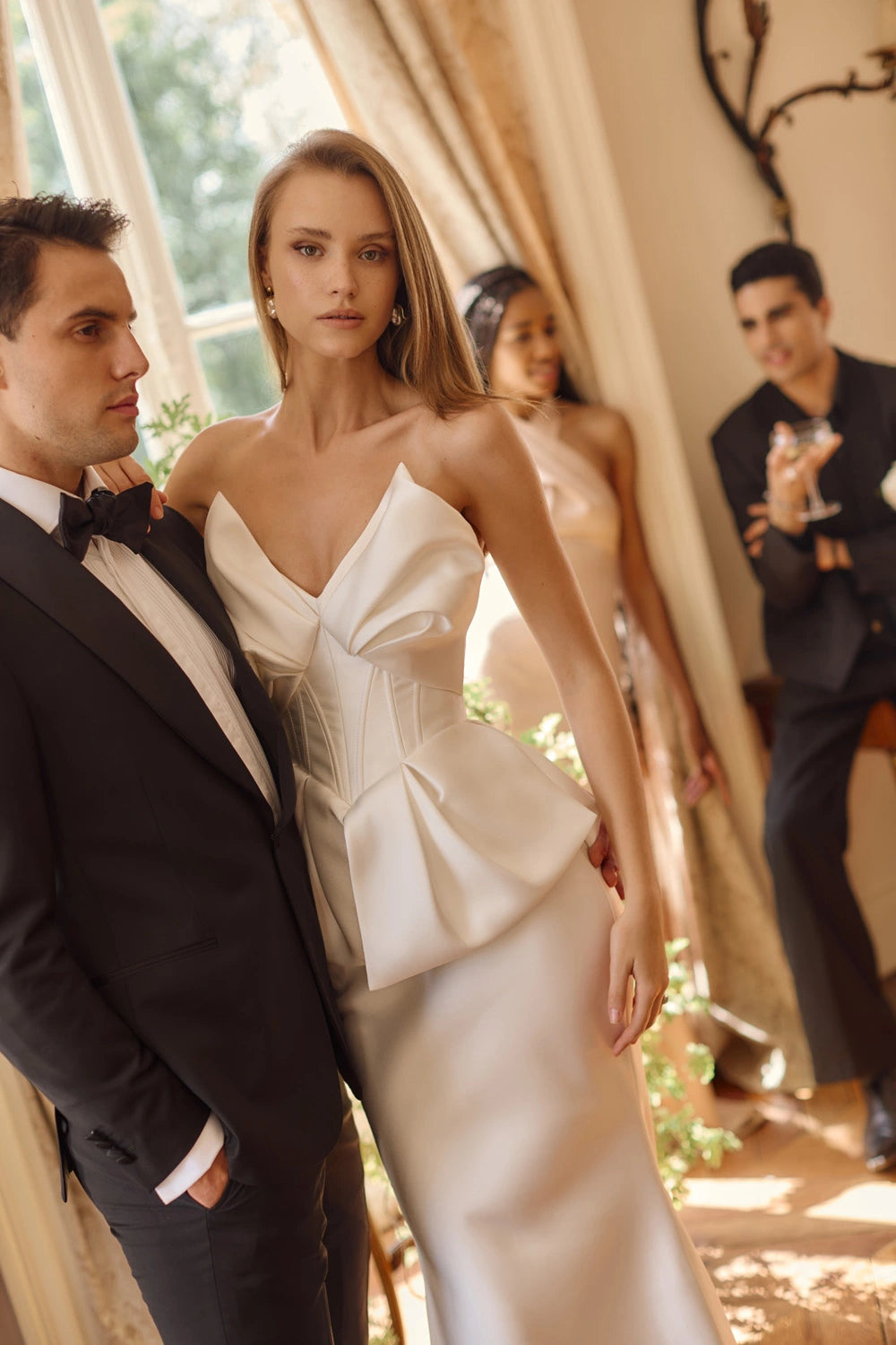 Elevate your evening wardrobe with the Nila Gown. The mermaid silhouette flatters your figure, while the bow-shaped corset neckline and peplum add a touch of elegance. Made with smooth fabric and a lace-up back, this dress is both sophisticated and comfortable. Perfect for any special occasion, make a statement in the Nila Gown.