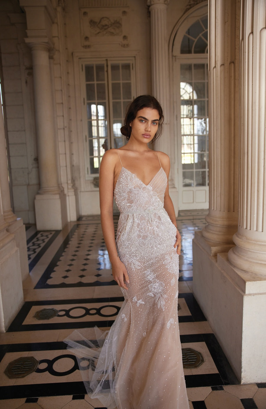 Take a chance with the Alber Dress! This stunning dress is adorned with beautiful crystals, making it the perfect choice for a unique bridal look. Embrace your adventurous side on your special day with this amazing piece.