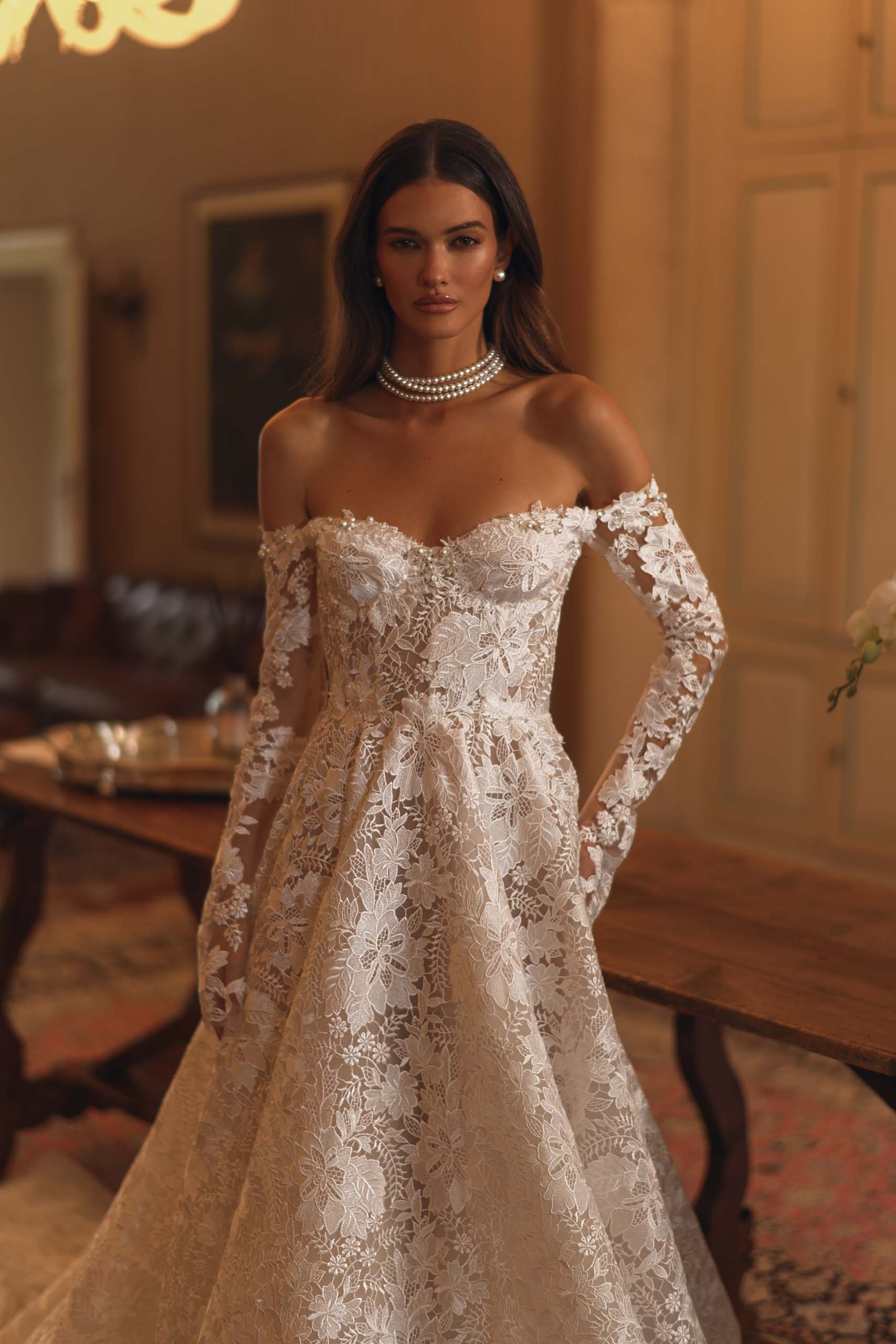 Discover the enchanting elegance of our Amira Gown, inspired by modern fairytales. Crafted with luxurious lace, this ballgown highlights your beauty and brings a touch of timeless grace to any special occasion. Make a statement with this stunning gown.