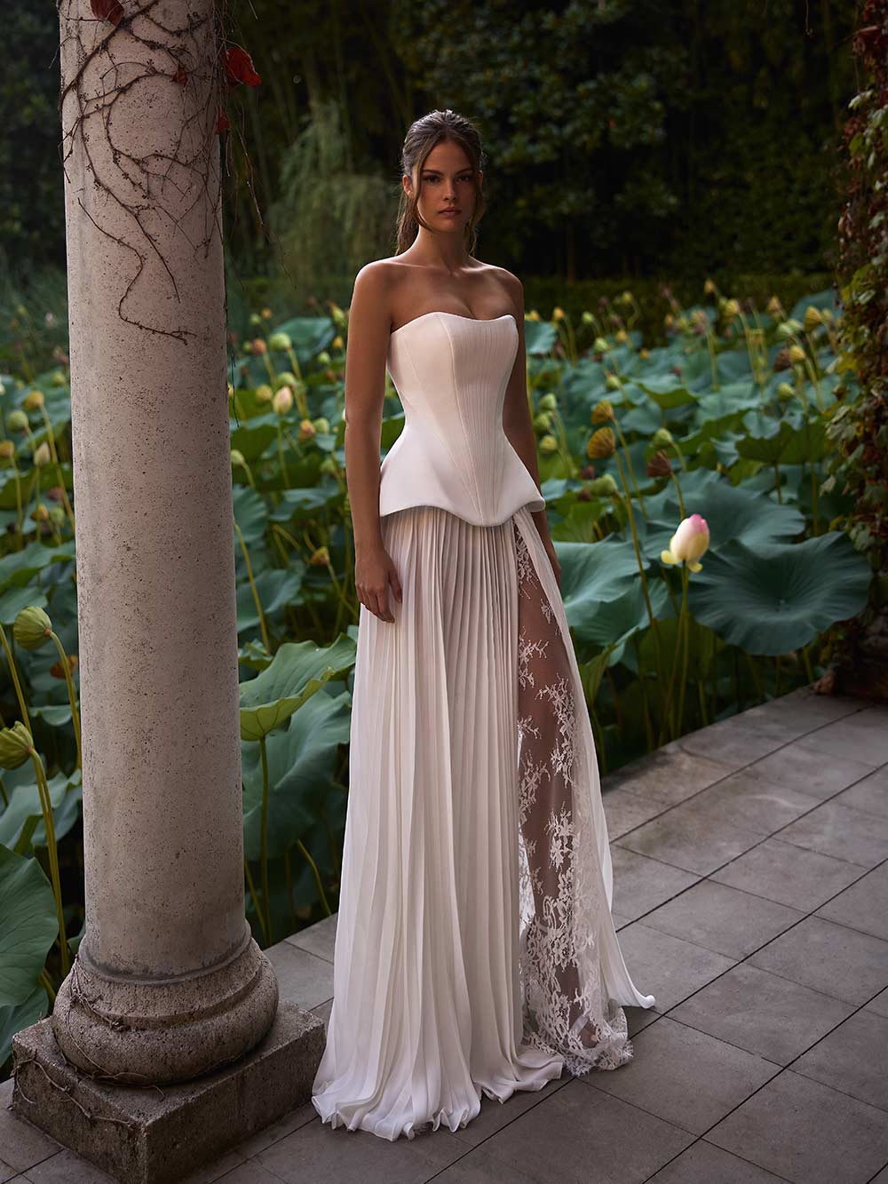 Indulge in the luxurious elegance of the Fiorella Dress. With a stunning satin sweet-heart design, this dress perfectly contours your figure, while structured boning offers support and a refined lace-up back creates a sharp, defined silhouette. It's the perfect piece for radiating timeless sophistication.
