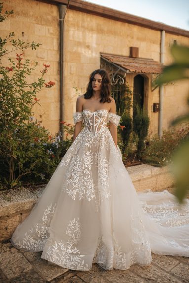 Look gorgeous on your special day with the Lina Gown. Boasting beautiful lace details, this is the gown that will make memories - and heads turn - at your romantic celebration. Be the beautiful and blushing bride you always dreamed of being!