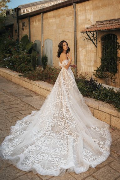 Look gorgeous on your special day with the Lina Gown. Boasting beautiful lace details, this is the gown that will make memories - and heads turn - at your romantic celebration. Be the beautiful and blushing bride you always dreamed of being!