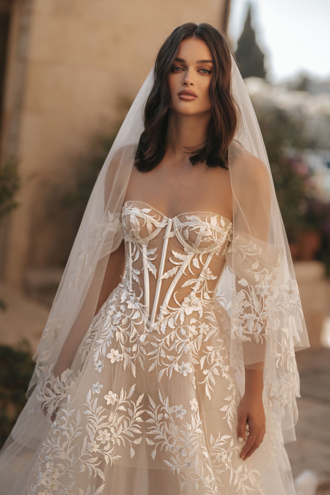 Look gorgeous on your special day with the Lina Gown. Boasting beautiful lace details, this is the gown that will make memories - and heads turn - at your romantic celebration. Be the beautiful and blushing bride you always dreamed of being!