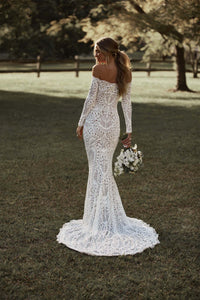 The Nathalia Gown exudes European charm with delicate textures and refined elegance. Its intricate trims and panelling evoke a romantic garden ambience, perfect for any special occasion. Embrace its timeless beauty and feel like a true fashion icon.