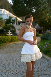 Indulge in luxury with our Robe Cherryl bridal gown! The white satin fabric with 3D flowers and lace up design brings a touch of elegance to your special day. With the A-line silhouette, this dress flatters all body types, making you feel confident and beautiful. Make your wedding dreams come true!