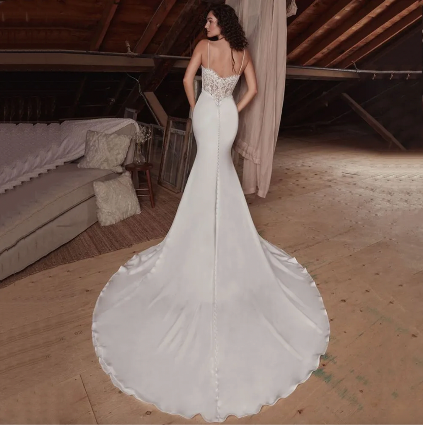 Elegant, sophisticated, and undeniably alluring, the Robe Sarita is the perfect wedding dress for the modern bride. With its strapless design, delicate lace appliques, and flattering mermaid silhouette, it exudes a sense of romance and grace. Whether you're walking down the aisle or dancing the night away, this gown will make you feel like the most beautiful bride.