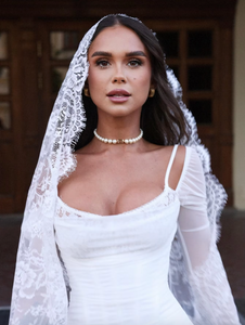 This elegant white lace dress is designed for special occasions, from birthday parties to weddings. The stretchy fabric and long sleeves provide both comfort and sophistication. Make a statement and feel confident in our must-have bridal dress.