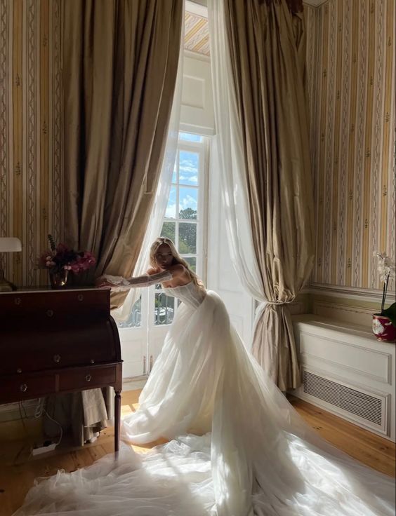 Elevate your special day with the captivating Robe Hannah. This elegant bridal gown exudes sophistication and grace, making you feel stunning as you walk down the aisle. Let its timeless design and flawless fit enhance your beauty and create timeless memories.