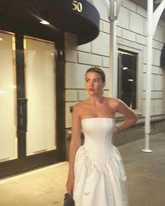 Upgrade your style with the versatile and feminine Maddison Dress. From the ceremony to the after-party, this strapless design effortlessly adapts to your desired look. Elevate your wedding attire with the perfect choice: the Eva Dress, your go-to for both beauty and functionality.