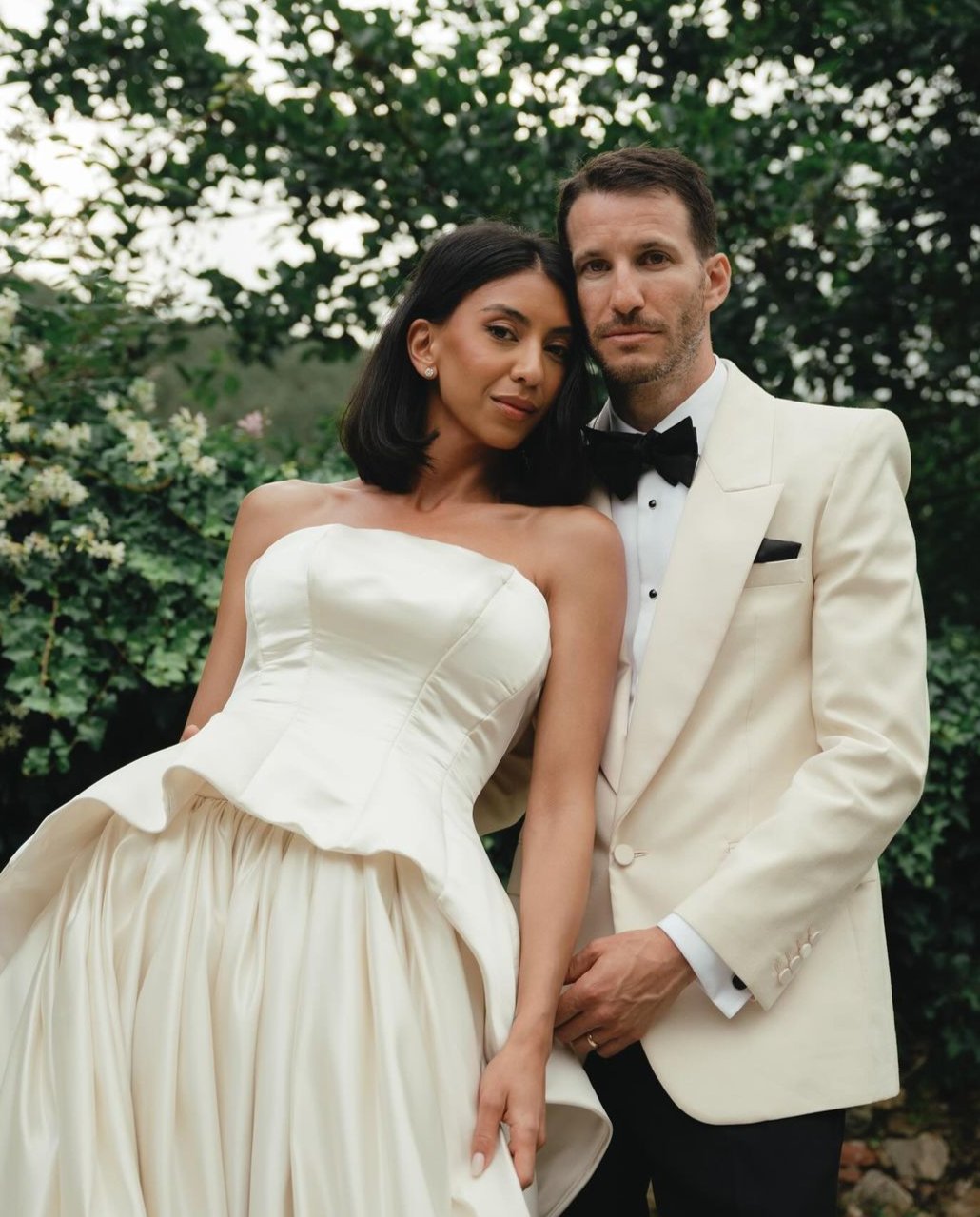 Get ready to walk down the aisle in style with our Romina Gown! This vintage-inspired wedding dress features a stunning backless design, elegant puff sleeves, and a flattering A-line silhouette. Made with soft, stain-resistant fabric, it's the perfect choice for your big day.