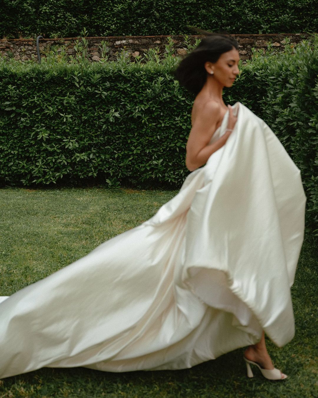 Get ready to walk down the aisle in style with our Romina Gown! This vintage-inspired wedding dress features a stunning backless design, elegant puff sleeves, and a flattering A-line silhouette. Made with soft, stain-resistant fabric, it's the perfect choice for your big day.