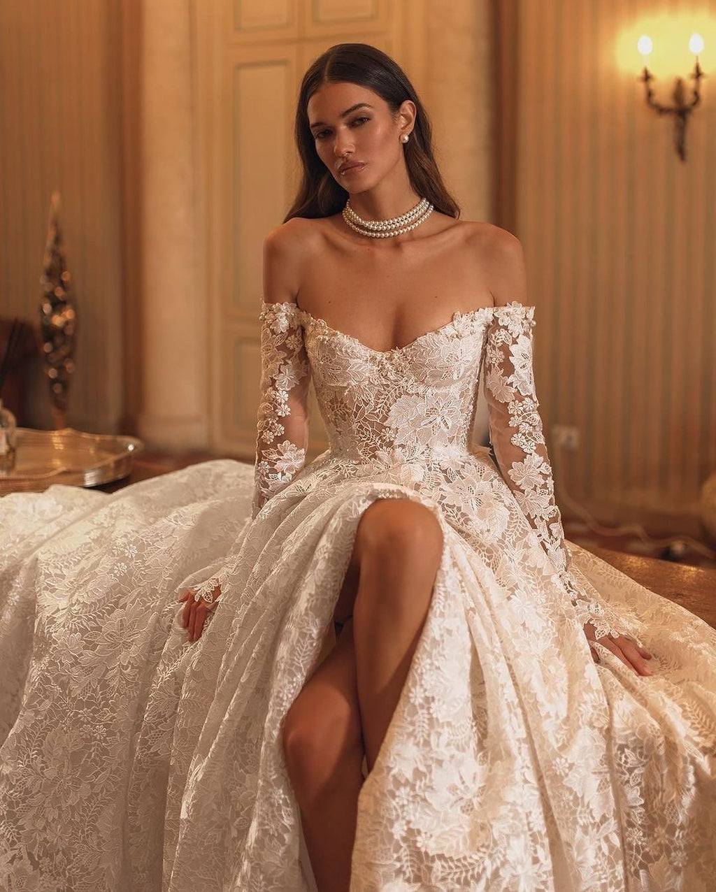 Discover the enchanting elegance of our Amira Gown, inspired by modern fairytales. Crafted with luxurious lace, this ballgown highlights your beauty and brings a touch of timeless grace to any special occasion. Make a statement with this stunning gown.