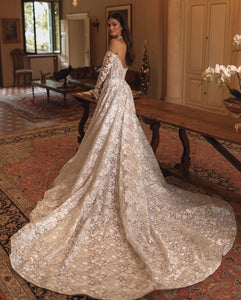 Discover the enchanting elegance of our Amira Gown, inspired by modern fairytales. Crafted with luxurious lace, this ballgown highlights your beauty and brings a touch of timeless grace to any special occasion. Make a statement with this stunning gown.