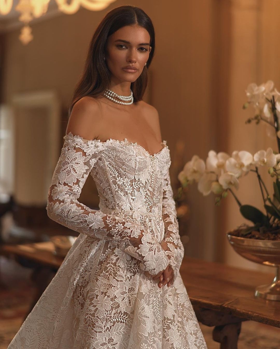 Discover the enchanting elegance of our Amira Gown, inspired by modern fairytales. Crafted with luxurious lace, this ballgown highlights your beauty and brings a touch of timeless grace to any special occasion. Make a statement with this stunning gown.