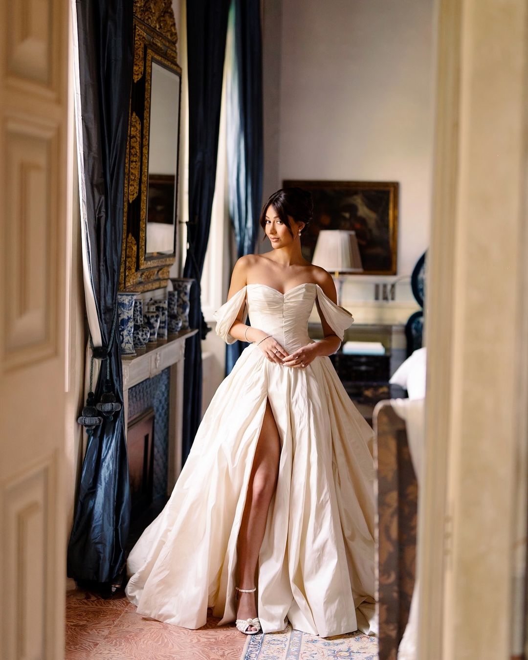 Discover the ultimate bridal elegance with our Bianca Gown! This exquisite princess-style gown features chic detailing and a stunning long train that will make you feel like royalty on your special day. Say "I do" in style with this elegant and timeless piece.