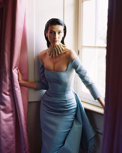 Indulge in pure elegance with the Jayne Gown. This striking piece features full-length sleeves and a delicate side train, adorned with luxurious feathers. Flawlessly tailored to accentuate your curves, this striking prom dress is an exquisite choice for any special occasion. Elevate your style to new heights with the Jayne Gown.