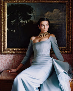 Indulge in pure elegance with the Jayne Gown. This striking piece features full-length sleeves and a delicate side train, adorned with luxurious feathers. Flawlessly tailored to accentuate your curves, this striking prom dress is an exquisite choice for any special occasion. Elevate your style to new heights with the Jayne Gown.