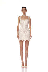 Elevate your bridal look with the Colette Lace Mini Dress. The sweetheart neckline and butterfly embellishments exude feminine grace, while the boned bodice and structured skirt provide a flattering silhouette. The hidden adjustable straps ensure a comfortable fit, making this dress perfect for your special day.