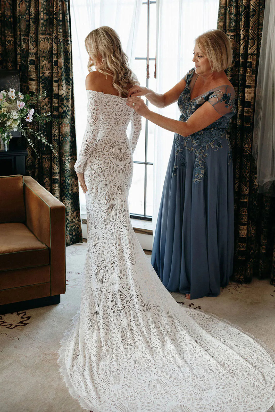 The Nathalia Gown exudes European charm with delicate textures and refined elegance. Its intricate trims and panelling evoke a romantic garden ambience, perfect for any special occasion. Embrace its timeless beauty and feel like a true fashion icon.