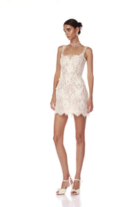 Elevate your bridal look with the Colette Lace Mini Dress. The sweetheart neckline and butterfly embellishments exude feminine grace, while the boned bodice and structured skirt provide a flattering silhouette. The hidden adjustable straps ensure a comfortable fit, making this dress perfect for your special day.