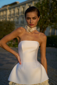 Indulge in luxury with our Robe Cherryl bridal gown! The white satin fabric with 3D flowers and lace up design brings a touch of elegance to your special day. With the A-line silhouette, this dress flatters all body types, making you feel confident and beautiful. Make your wedding dreams come true!
