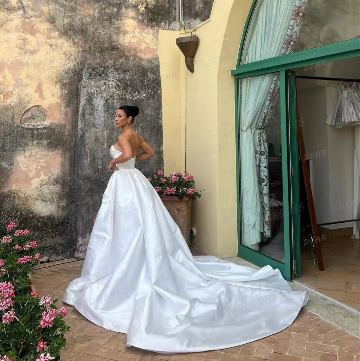Be the bride of everyone's dreams with the Eva Gown. This chic and simple white satin dress exudes elegance and romance, making you feel like a fairytale princess on your special day. Say "I do" to this dreamy and stylish gown.