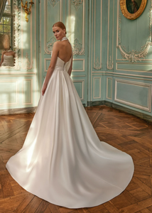 Step into elegance and grace with the Bellina Gown. The delicate neckline, flowing lace, and intricate bugles beads and embroidery create a stunning look. With an open back to add a touch of allure, this gown is perfect for any special occasion. Elevate your style with the Bellina Gown!