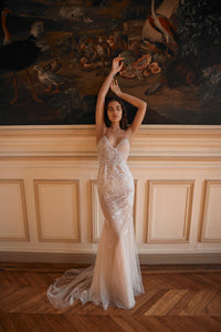 Take a chance with the Alber Dress! This stunning dress is adorned with beautiful crystals, making it the perfect choice for a unique bridal look. Embrace your adventurous side on your special day with this amazing piece.