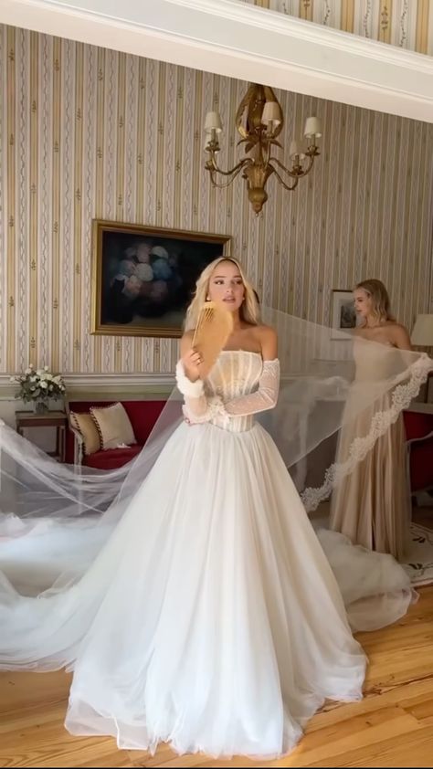 Elevate your special day with the captivating Robe Hannah. This elegant bridal gown exudes sophistication and grace, making you feel stunning as you walk down the aisle. Let its timeless design and flawless fit enhance your beauty and create timeless memories.
