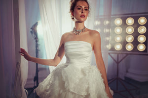 Look beautiful and feel magical in the Candice Gown! This outstanding dream-like wedding gown will make all your nuptial fantasies come true. No matter your size or shape, this robe will be sure to fit like a glove and make you look and feel divine on your special day. Get ready to be spellbinding!