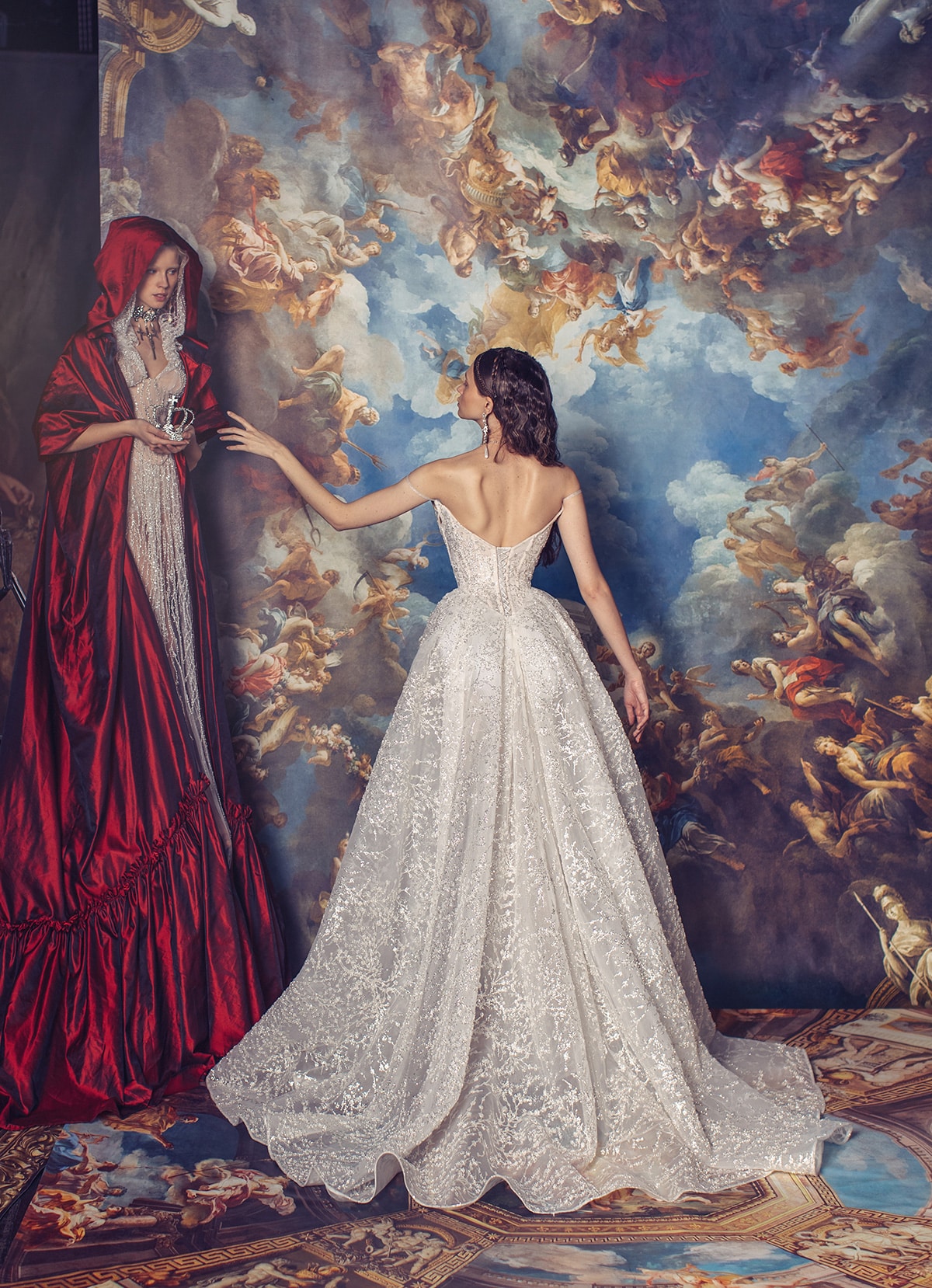 Indulge in luxury with the Elizabeth Gown. Exquisite and hand-crafted, this dress features a corseted bodysuit adorned with intricate appliqué and delicate lace overlay. The voluminous silk taffeta skirt adds a touch of drama, making it the perfect choice for your special occasions. Elevate your style and make a statement with this exclusive and elegant gown.