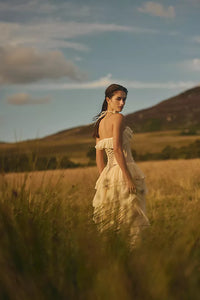 Take center stage and make a bold statement in the Ballet Gown. Made of luxurious silk chiffon, this gown features cascading ruffle tiers, bust ruffle, and silicone elastic trim for a secure fit. The invisible zipper and internal shelf bra add convenience, while the lightweight mesh bodice adds breathability. Unleash your inner risk-taker and shine in the Ballet Gown!
