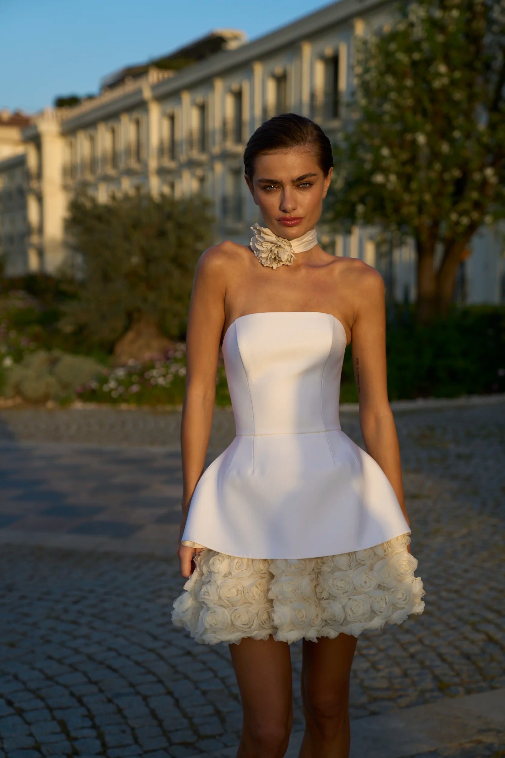 Indulge in luxury with our Robe Cherryl bridal gown! The white satin fabric with 3D flowers and lace up design brings a touch of elegance to your special day. With the A-line silhouette, this dress flatters all body types, making you feel confident and beautiful. Make your wedding dreams come true!