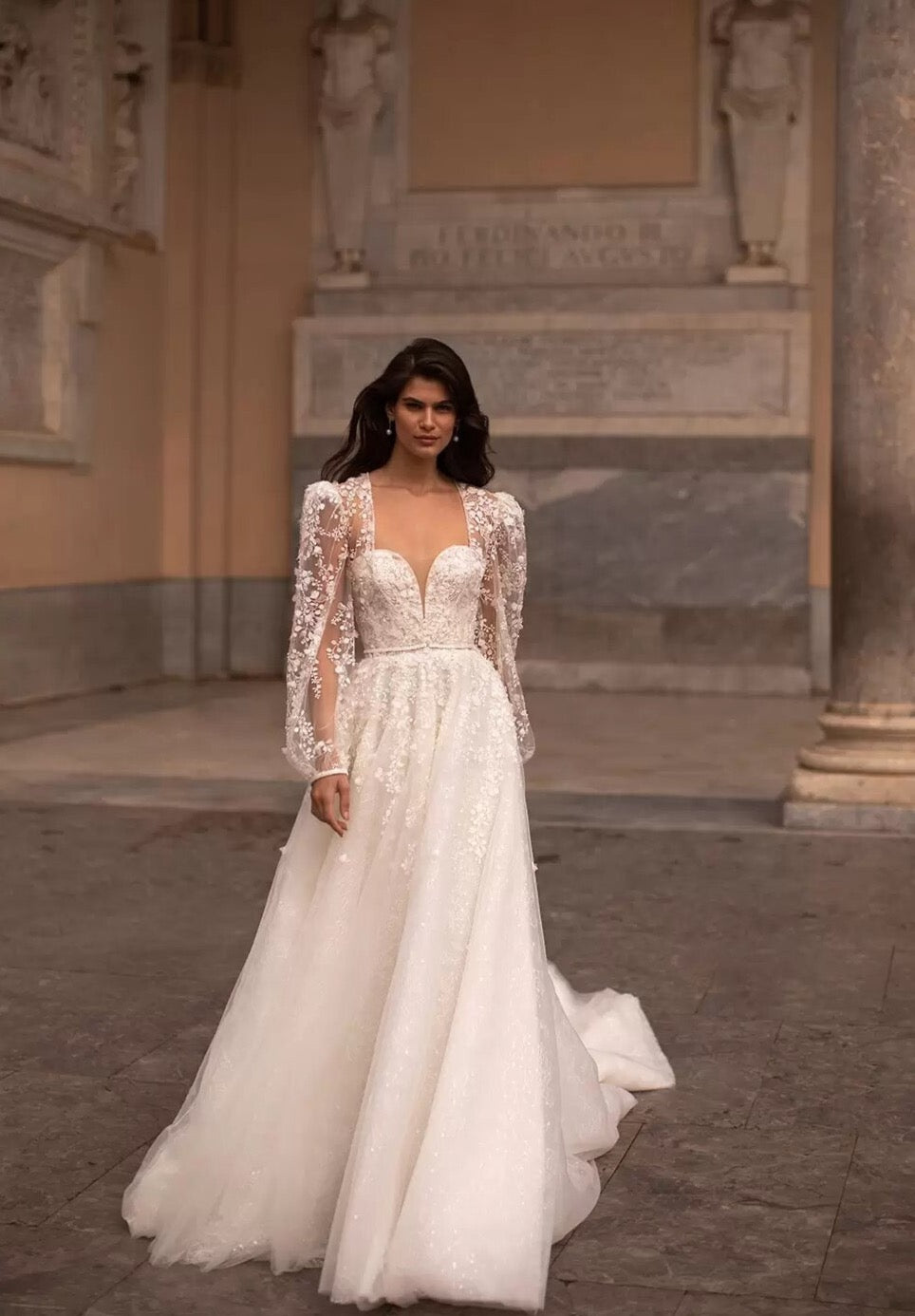 Feel elegant and chic in Robe Margot's two-piece A-line wedding dress! This bridal look is perfect for making a statement, without going overboard. Whether it's your special day or just an occasion for dress-up, you're sure to steal the show. Get ready for your big entrance!