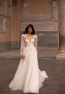 Feel elegant and chic in Robe Margot's two-piece A-line wedding dress! This bridal look is perfect for making a statement, without going overboard. Whether it's your special day or just an occasion for dress-up, you're sure to steal the show. Get ready for your big entrance!