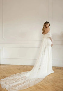 Put a sparkle in your special day with the gorgeous Robe Denisse! Featuring a sweetheart neckline with full long sleeves, this unique sheath bridal gown is sure to turn heads. Wearing it won't just make you look beautiful - you'll feel beautiful too! Make your wedding day unforgettable with Robe Denisse!