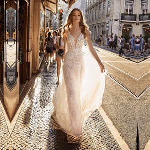 Elevate your elegance and grace with the Claire Dress. This wedding gown is an exceptional choice for your special occasion, showcasing unparalleled style. Make a dazzling statement in this magnificent gown - exude confidence and stand out!