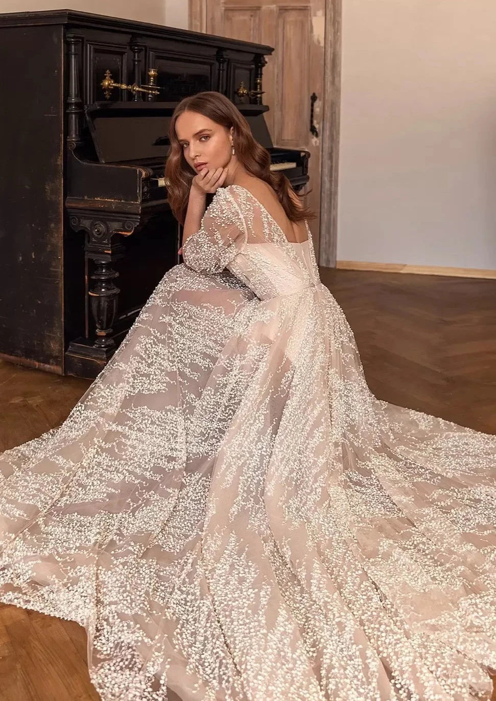 Be the belle of the bridal party in our Robe Sophina. Featuring a lace neckline, short sleeves, and a flattering belt, this gown is the perfect balance of elegance and comfort. Walk down the aisle in style with this must-have for any bride-to-be. (Wedding bells not included!)