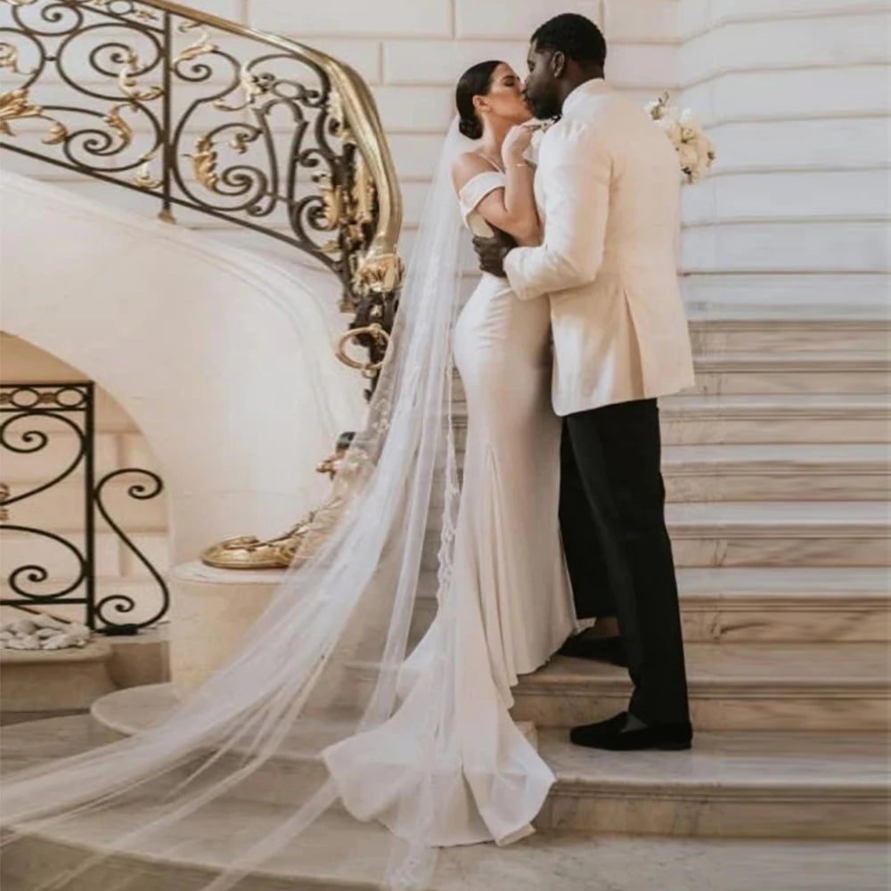 Capture hearts in the beautiful Satin Dress Emma. Custom made with exquisite details, this classic outdoor wedding dress is perfect for a stunning and elegant look on your special day. Enjoy the open design as you confidently walk down the aisle. Make a statement that will be remembered forever.