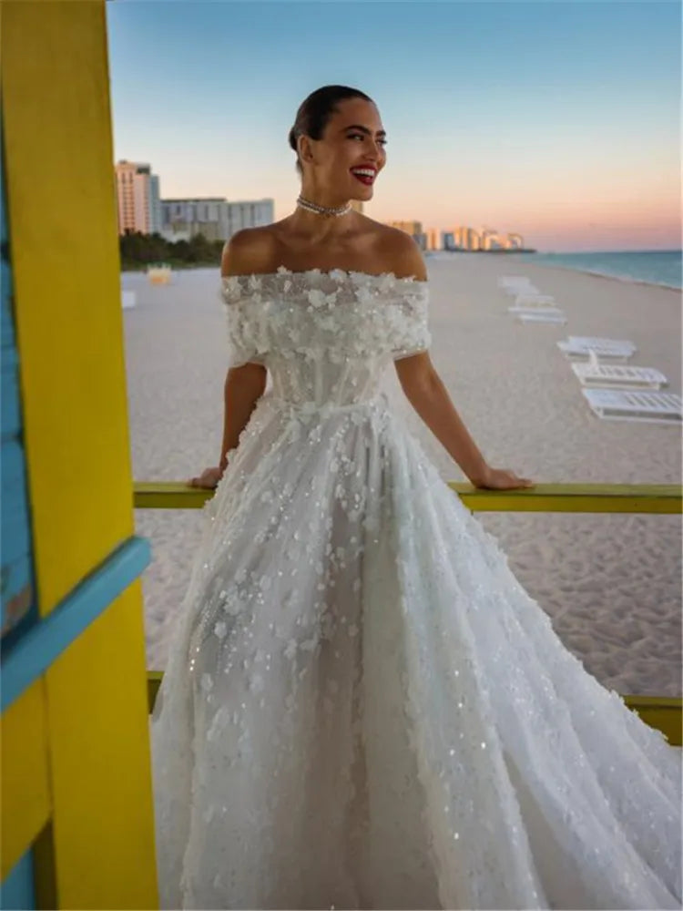 Indulge in the opulence of our Robe Julienne, a luxury bridal dress that exudes elegance and sophistication. This ball gown features exquisite lace detailing, making it the perfect choice for a fairy-tale wedding. Embrace luxury on your special day with this timeless and tasteful masterpiece.