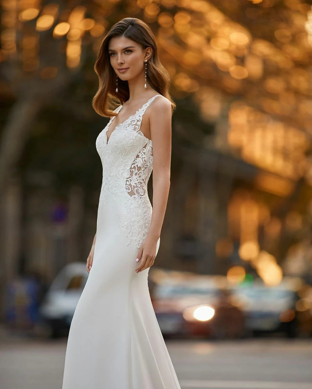Make a splash on your big day with the Robe Desi. This elegant lace mermaid wedding dress is perfect for the boho bride, featuring a satin bodice and sleeveless design. Show off your curves and dance the night away in this stunning and unique gown.