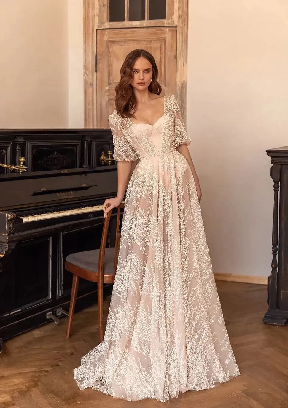 Be the belle of the bridal party in our Robe Sophina. Featuring a lace neckline, short sleeves, and a flattering belt, this gown is the perfect balance of elegance and comfort. Walk down the aisle in style with this must-have for any bride-to-be. (Wedding bells not included!)