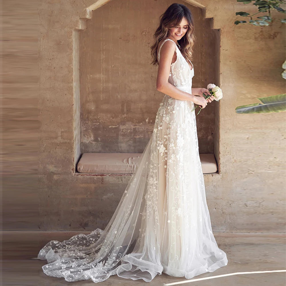 Get ready to turn heads in the stunning Dress Berenice! Perfect for a beach wedding or boho event, this elegant dress features a sexy off the shoulder neckline and v-neck with an open back design. With its flowing mopping silhouette, you'll feel like a bohemian princess on your special day.