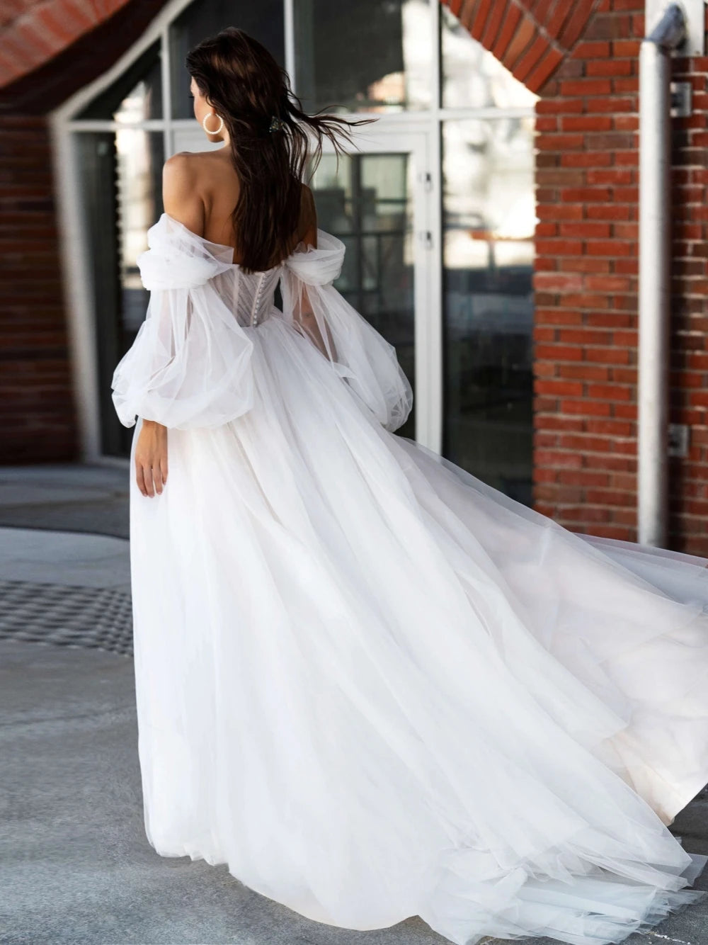 Indulge in pure luxury with our Robe Lova. This elegant off the shoulder wedding dress features sparkling sequins and beads, perfect for the modern bride. Its A-line silhouette flatters all body types, while the pristine white color adds an air of sophistication. Make a statement on your special day with this exclusive piece.