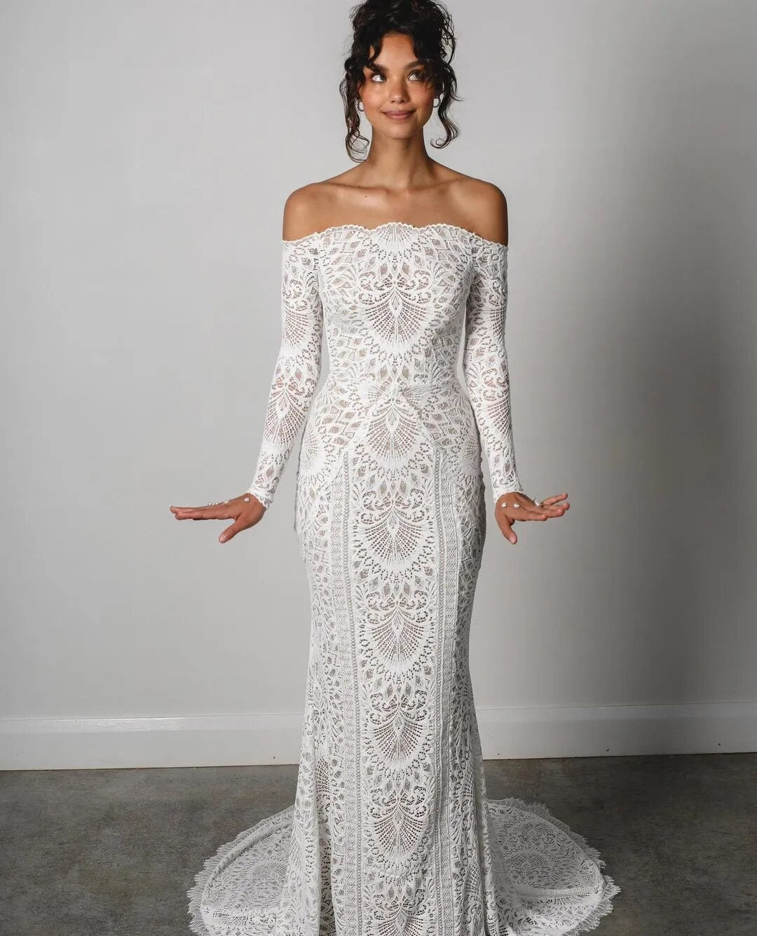 The Nathalia Gown exudes European charm with delicate textures and refined elegance. Its intricate trims and panelling evoke a romantic garden ambience, perfect for any special occasion. Embrace its timeless beauty and feel like a true fashion icon.