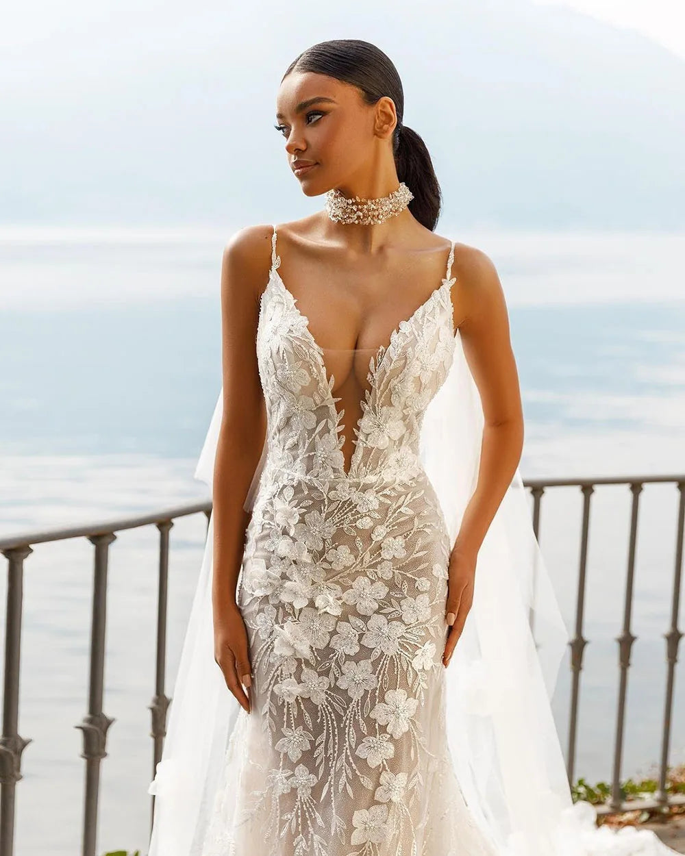 Be a whimsical bride in our Robe Rosette! Designed with delicate fairy lace, this mermaid wedding dress will make you feel like a dream. Dance the night away in its flowing skirt and stun your guests with its elegant rosette details. Perfect for a fairytale wedding.
