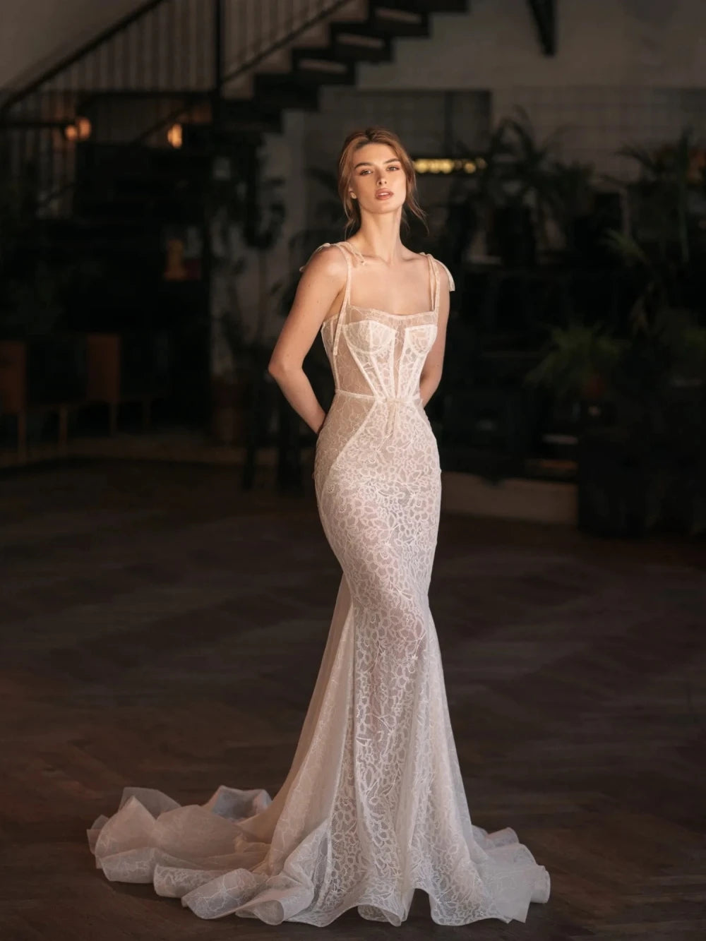 Indulge in elegance with our Robe Katarina. This classic square neck wedding dress features graceful spaghetti straps and delicate lace details for a modest, yet alluring look. The mermaid silhouette and long length make it perfect for a sophisticated bride. Exclusively designed for you, our Robe De Mariée is a must-have for your special day.