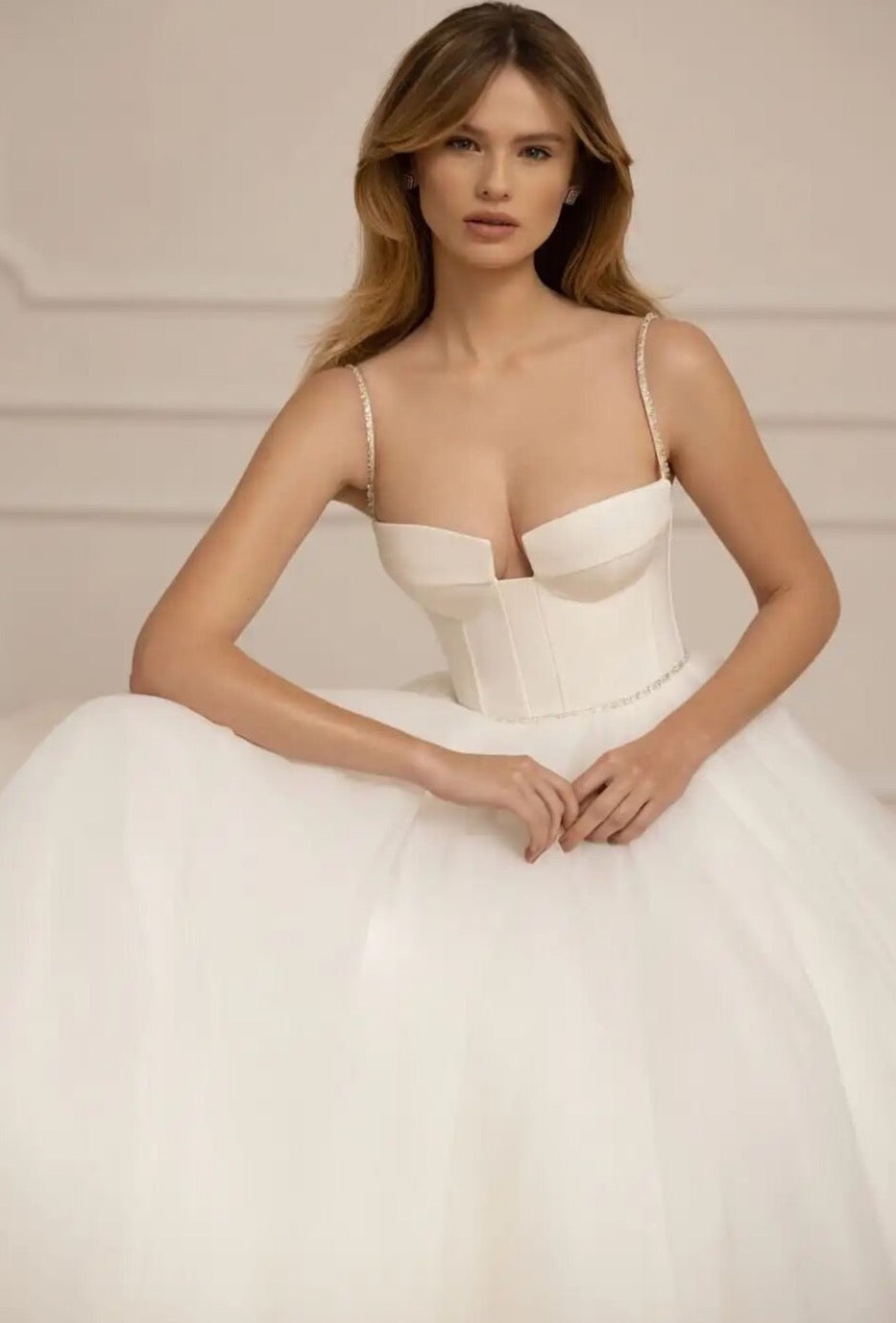 Look sensational in Christina's luxurious wedding dress! Featuring a classic sweetheart neckline and spaghetti straps, this a-line gown adds effortless grace to any special day. Delicate beading and hand-crafted details ensures a beautiful and timeless look that celebrates your special day.